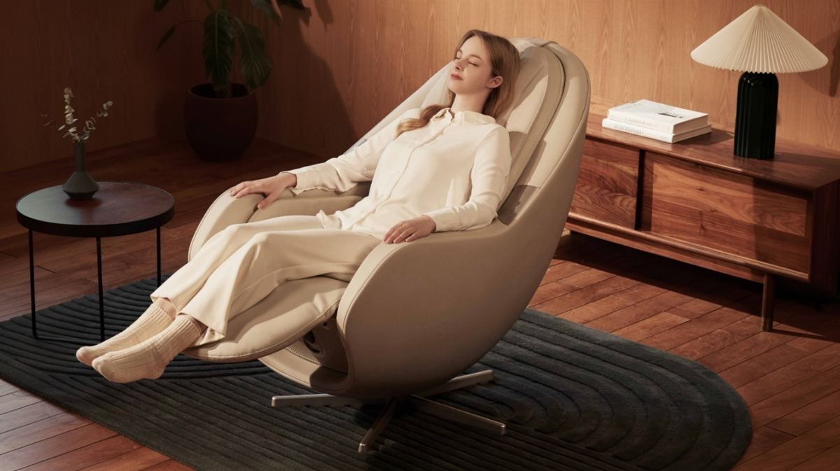 Ceragem Pause M6 massage chair with user reclining during thermal massage in warm home setting