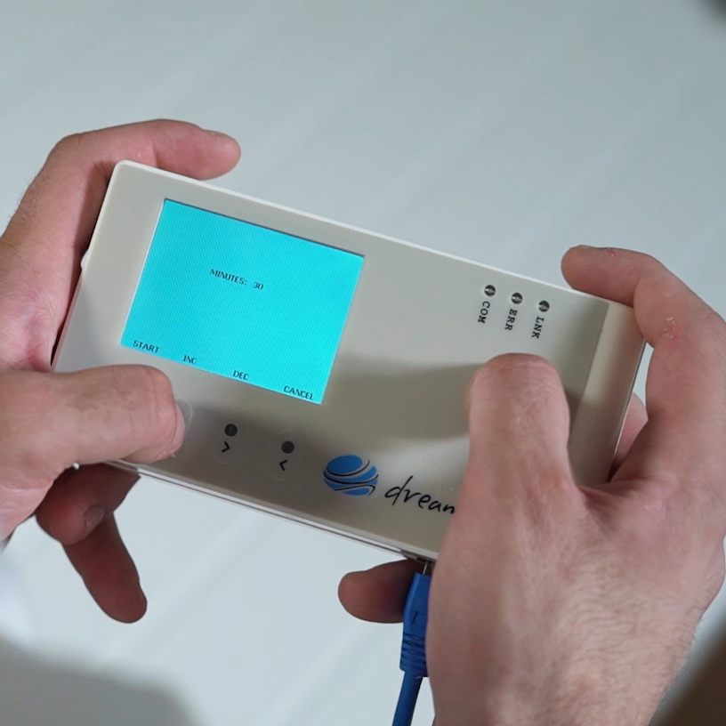 Dreampod Home Float Pro control system handheld interface displaying session timer and operational controls