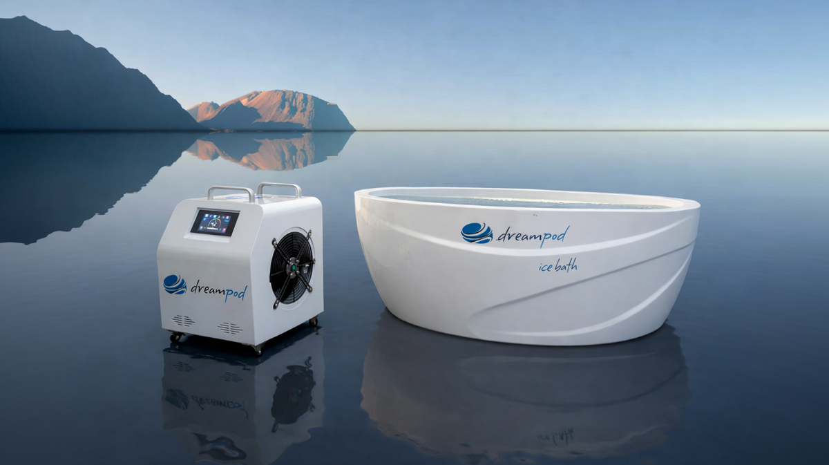 Dreampod ice bath tub with chiller heater system positioned outdoors near water with reflective surface and scenic background