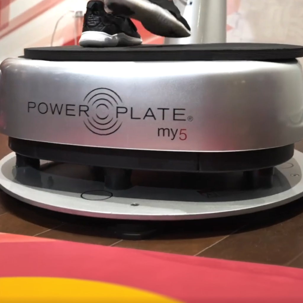 Power Plate my5 vibration platform mounted on Power Shield vibration reduction base designed to minimize floor vibration during whole body vibration training