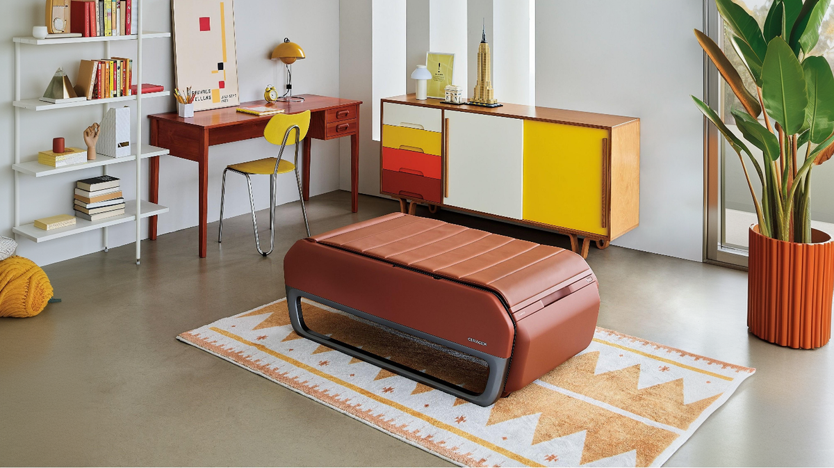 Ceragem Master V7 thermal massage bed folded in modern home office environment demonstrating compact lifestyle integration