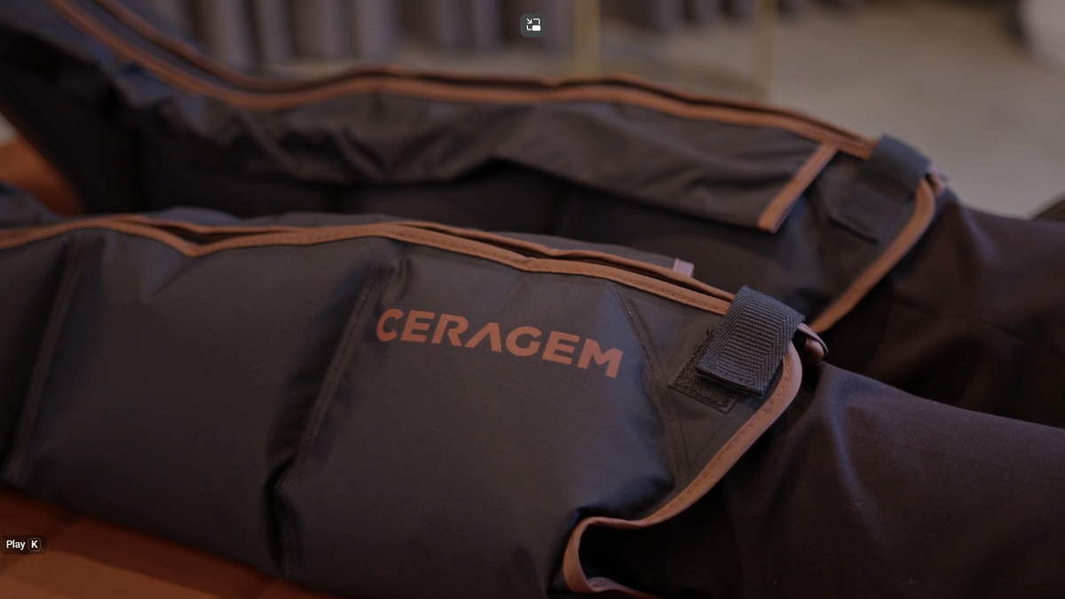 Ceragem Master V9 aircell leg massager wrapped around legs showing compression therapy design and material detail