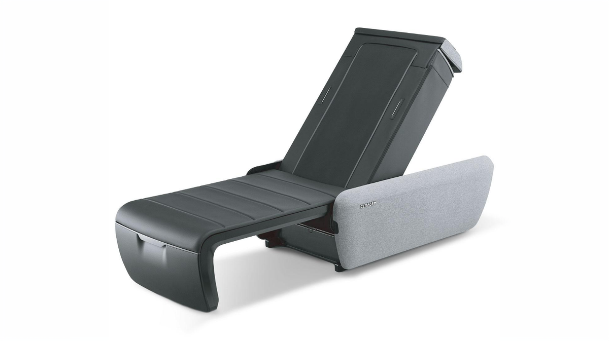 Ceragem Master V9 massage bed in black finish positioned in reclined therapy mode on a neutral studio background