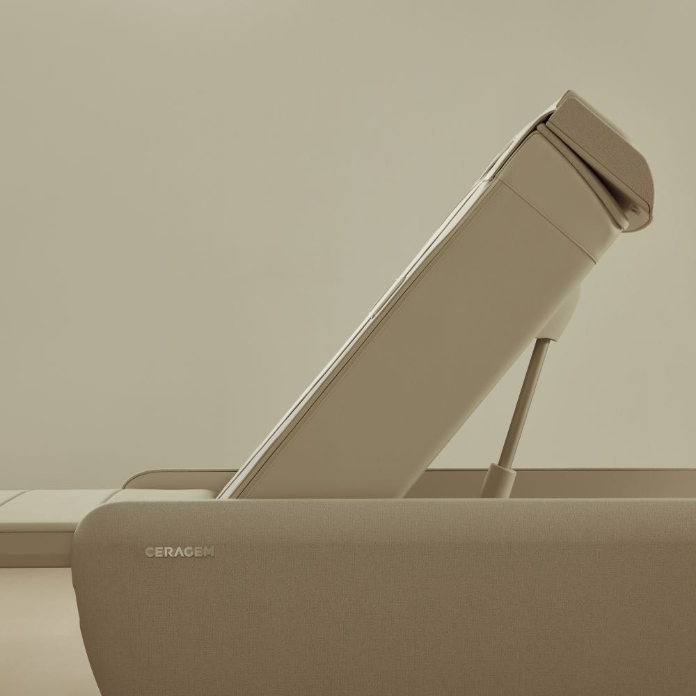 Ceragem Master V9 massage bed side profile showing recline angle and internal support mechanism in operation