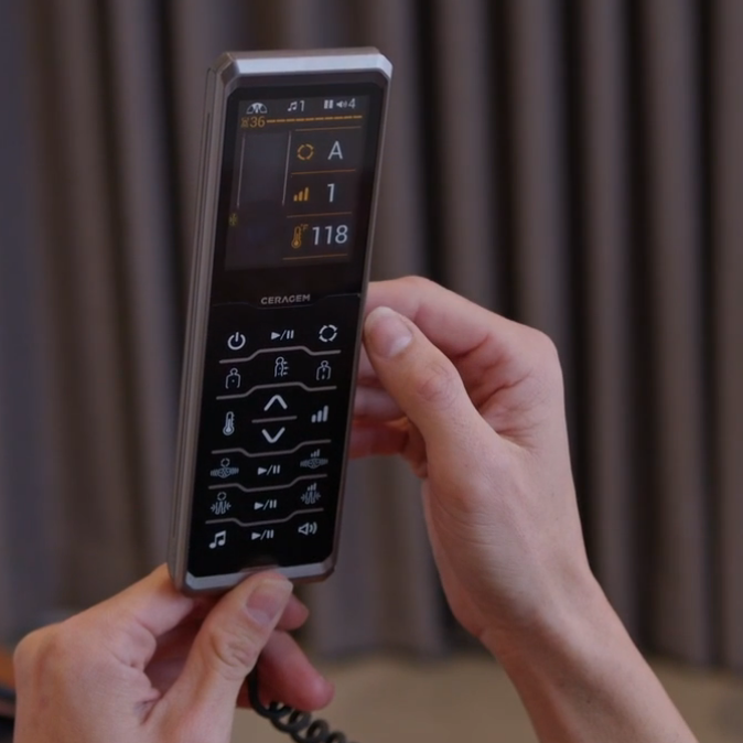 Ceragem Master V9 remote control displaying touch interface for selecting massage modes temperature and therapy settings