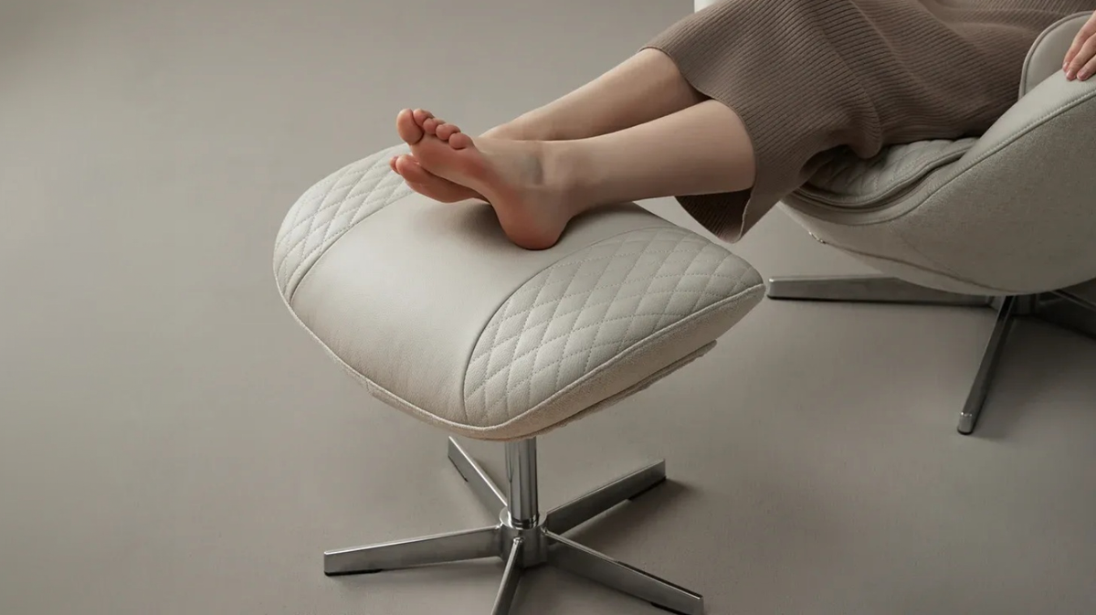 Ceragem Pause M4 massage chair footrest ottoman supporting legs in use within home setting