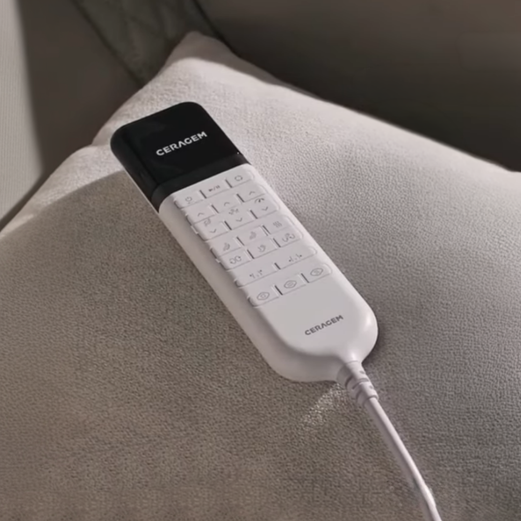 Ceragem Pause M4 massage chair remote control interface shown in close-up on seat surface