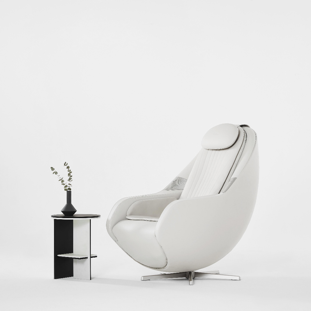 Ceragem Pause M6 beige massage chair side view placed in minimal white interior setting