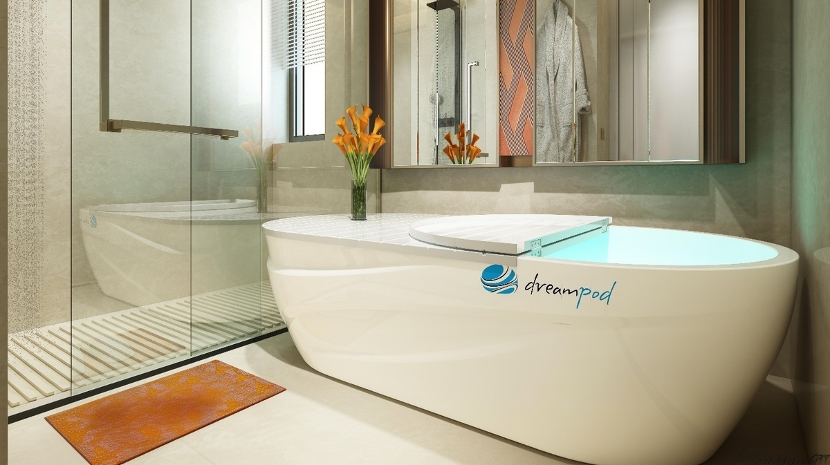 Dreampod Mineral Soaker heated soaking system installed in modern bathroom with glass shower and ambient lighting