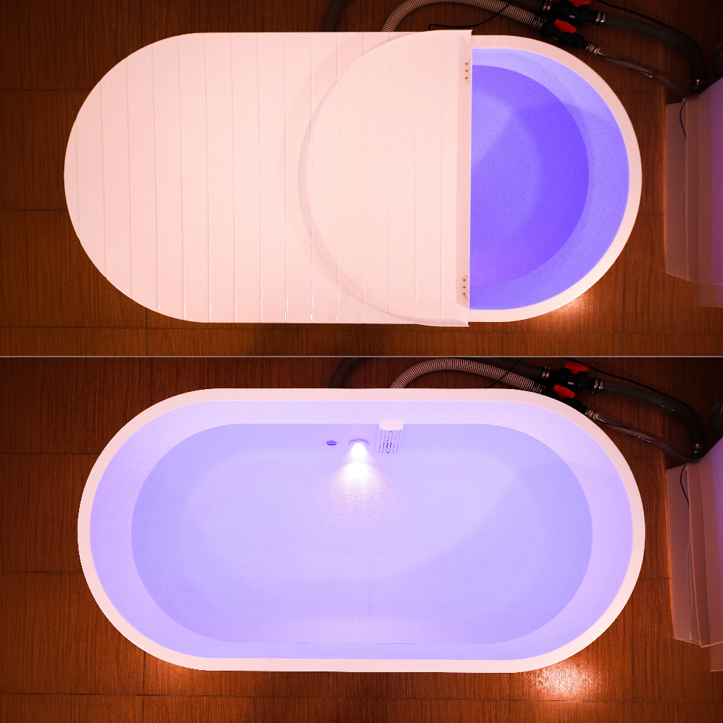 Dreampod Mineral Soaker mineral bath system top view showing open and closed lid positions with illuminated interior