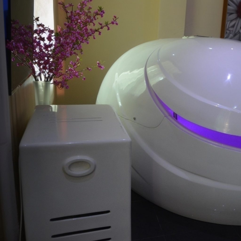 Dreampod V2 float pod commercial float tank with engine box positioned beside pod for filtration and system operation