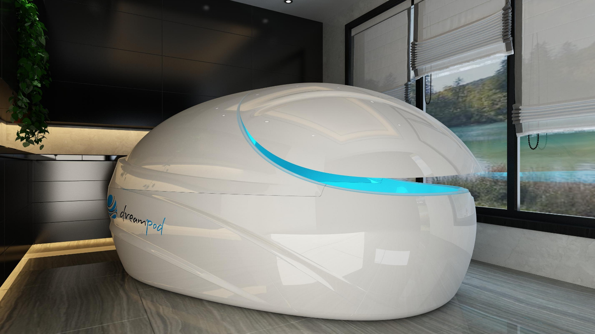 Dreampod Vmax float pod commercial float tank closed in modern wellness room with large windows and natural light