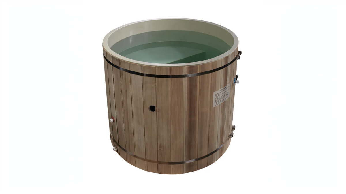Dynamic Cold Therapy cold plunge barrel filled with water showing interior seating and immersion depth from top view