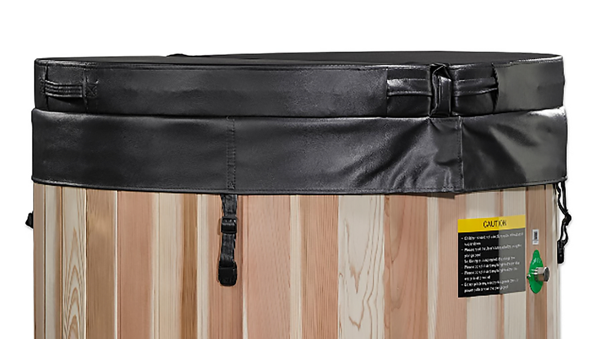 Dynamic Cold Therapy cold plunge barrel insulated cover close-up showing strap closure and top seal detail