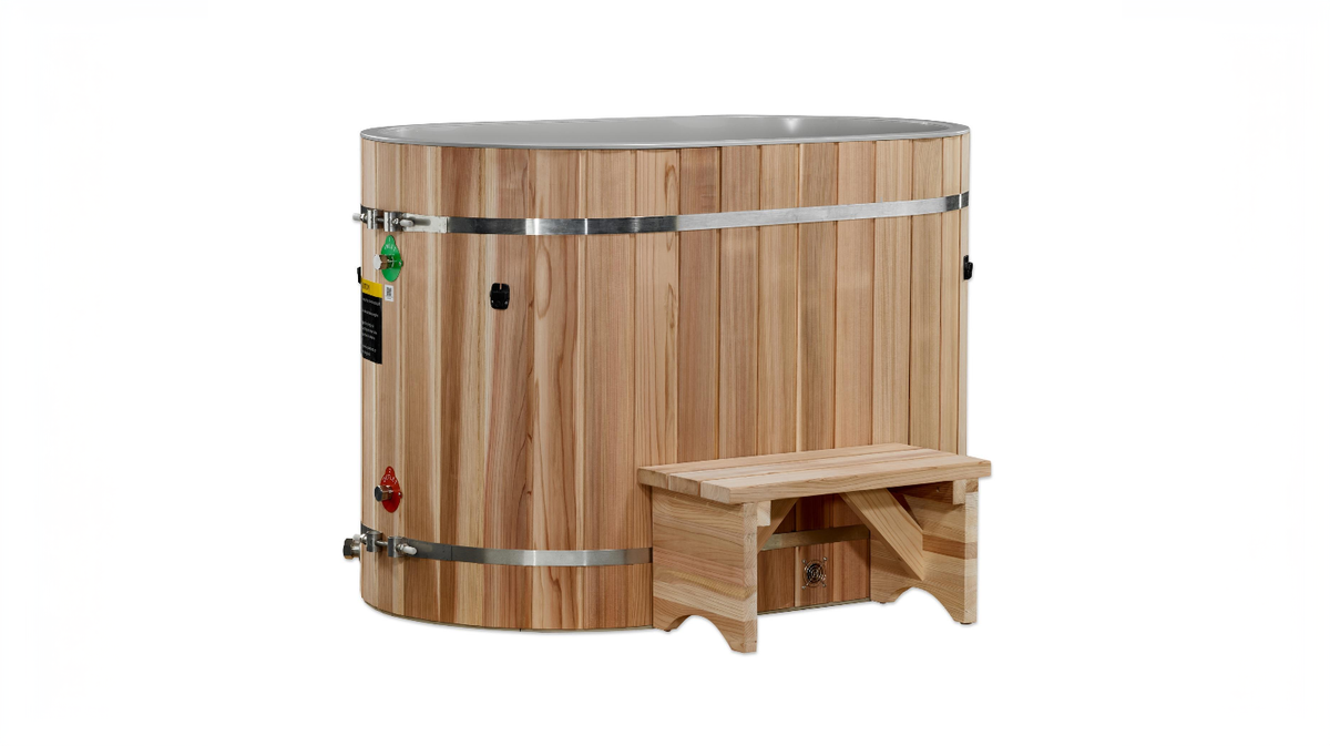 Dynamic Cold Therapy oval cold plunge tub with cedar exterior and step stool in clean studio product view