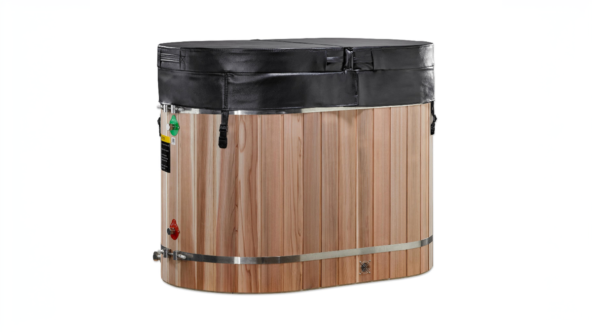 Dynamic Cold Therapy oval cold plunge tub cedar barrel with insulated cover secured on clean white studio background
