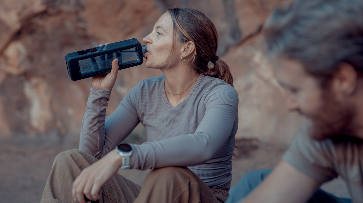 Echo Flask hydrogen water bottle used for hydration during outdoor hiking and active lifestyle setting