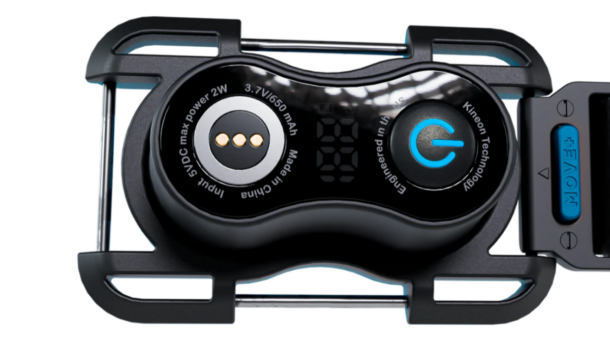 Kineon MOVE+ wearable red light therapy device control module showing display interface power button and settings close-up