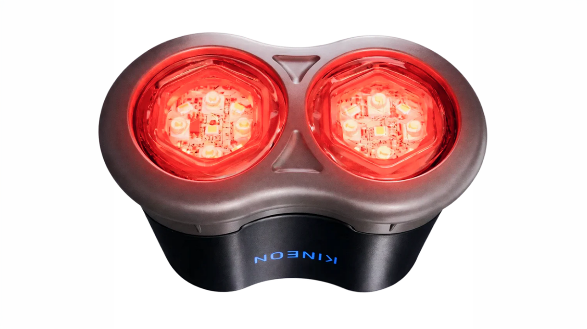 Kineon MOVE+ red light therapy device showing illuminated LED light modules during active light emission close-up