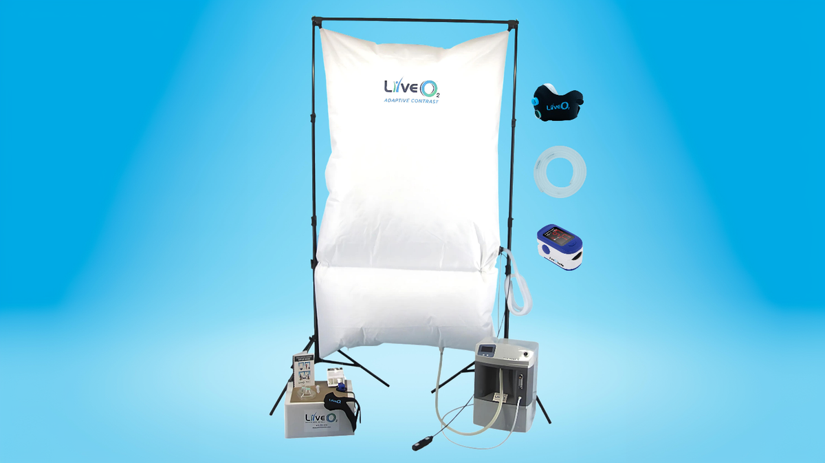 LiveO2 Adaptive Contrast EWOT system with extra-large high altitude chamber full components layout showing included chamber, tubing, mask, pulse oximeter, and air separator