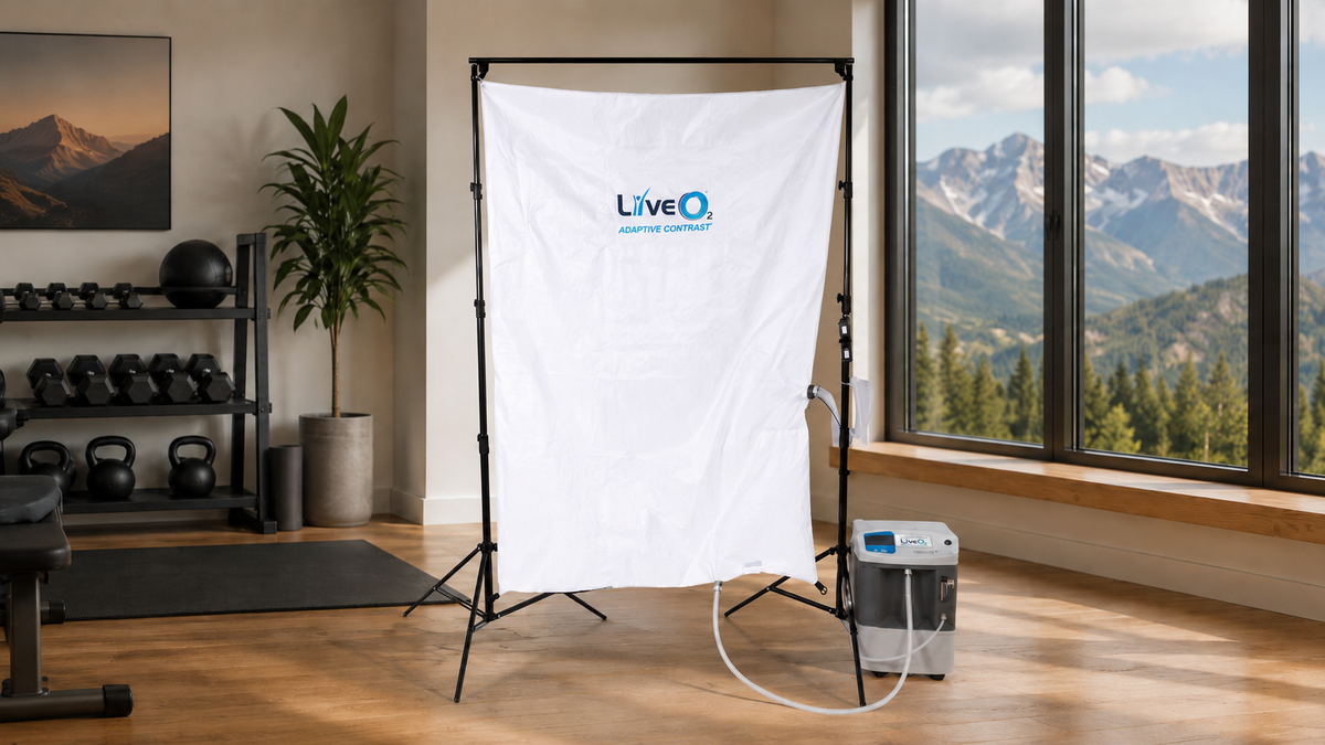 LiveO2 Adaptive Contrast EWOT system with reservoir and air separator in a home gym with mountain-view windows