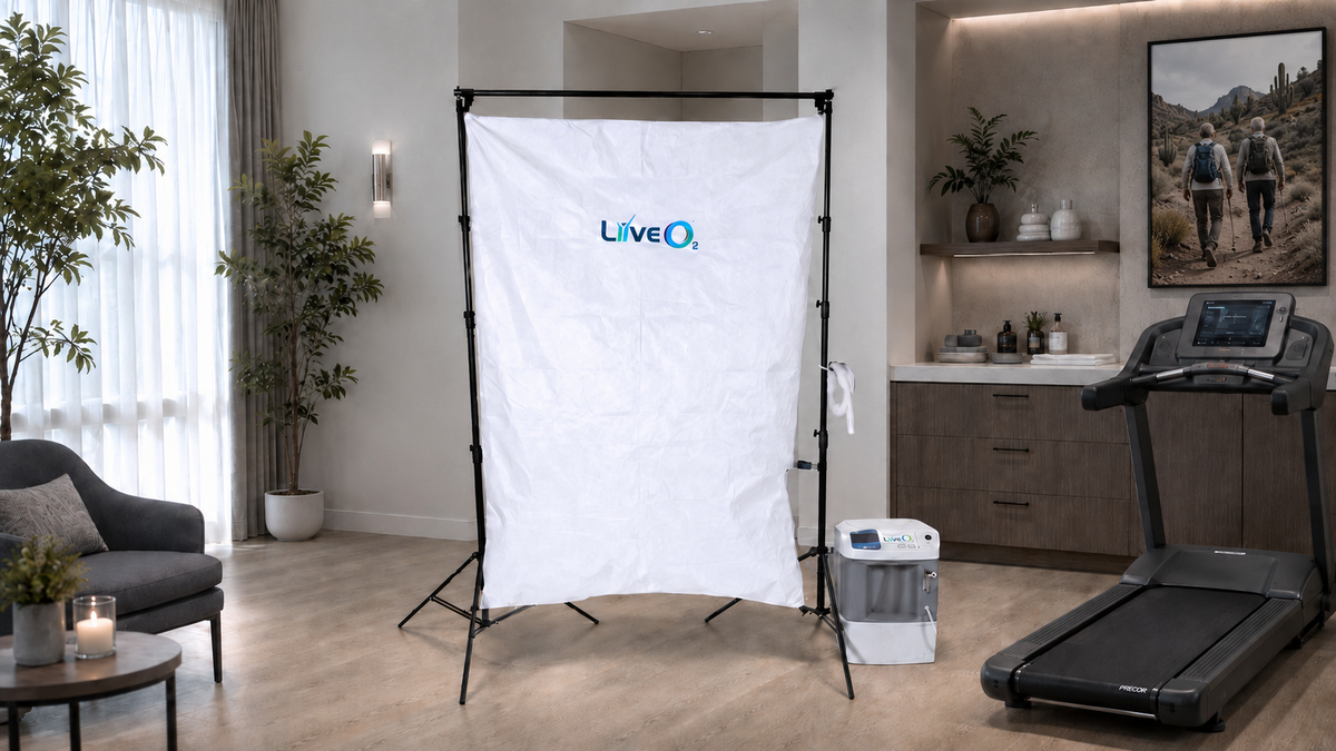 LiveO2 EWOT Oxygen Training System for home use with reservoir, 10 LPM air separator, tubing, and treadmill in a wellness room