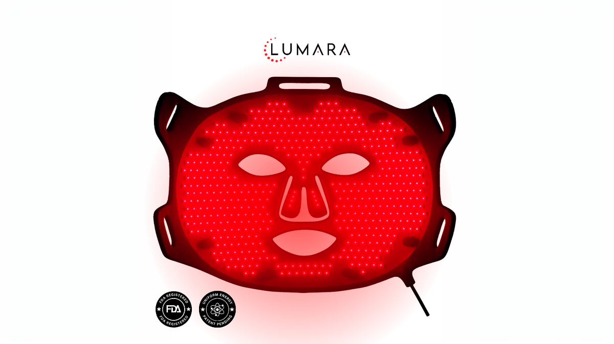 Lumara Viso LED light therapy mask illuminated showing full facial coverage red light treatment design