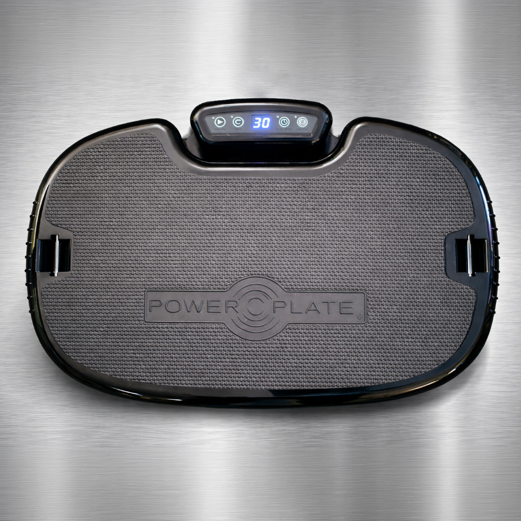 Top view of Personal Power Plate vibration platform showing PrecisionWave vibration training surface and integrated control display.