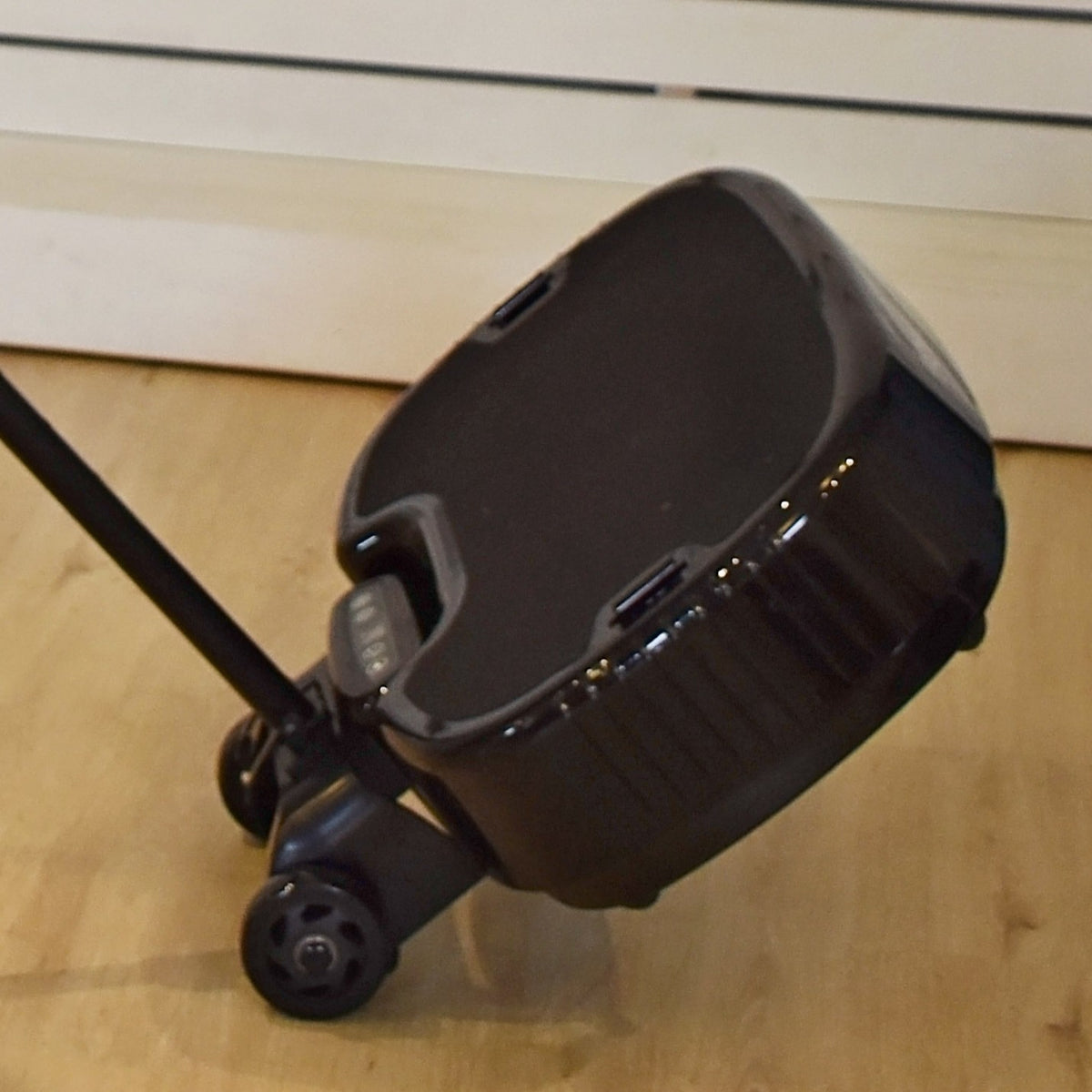 Integrated transport wheels on the Personal Power Plate Stability Bar allowing the vibration platform to tilt and roll for easier repositioning between workout spaces
