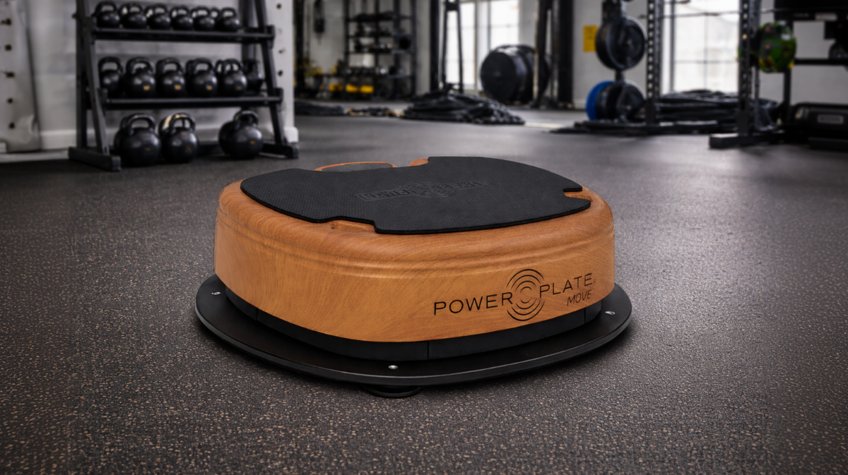 Power Plate MOVE vibration platform positioned on the Power Shield vibration isolation platform designed to reduce residual vibration transmitted through flooring during training.