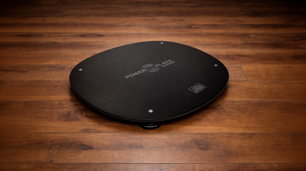 Power Plate MOVE Power Shield vibration isolation platform designed to reduce vibration transfer through flooring during whole body vibration training.