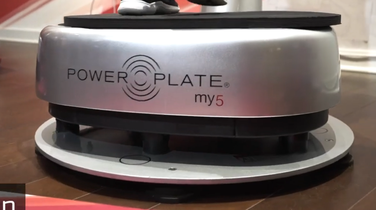 Power Plate my5 vibration platform mounted on Power Shield vibration reduction base designed to minimize floor vibration during whole body vibration training