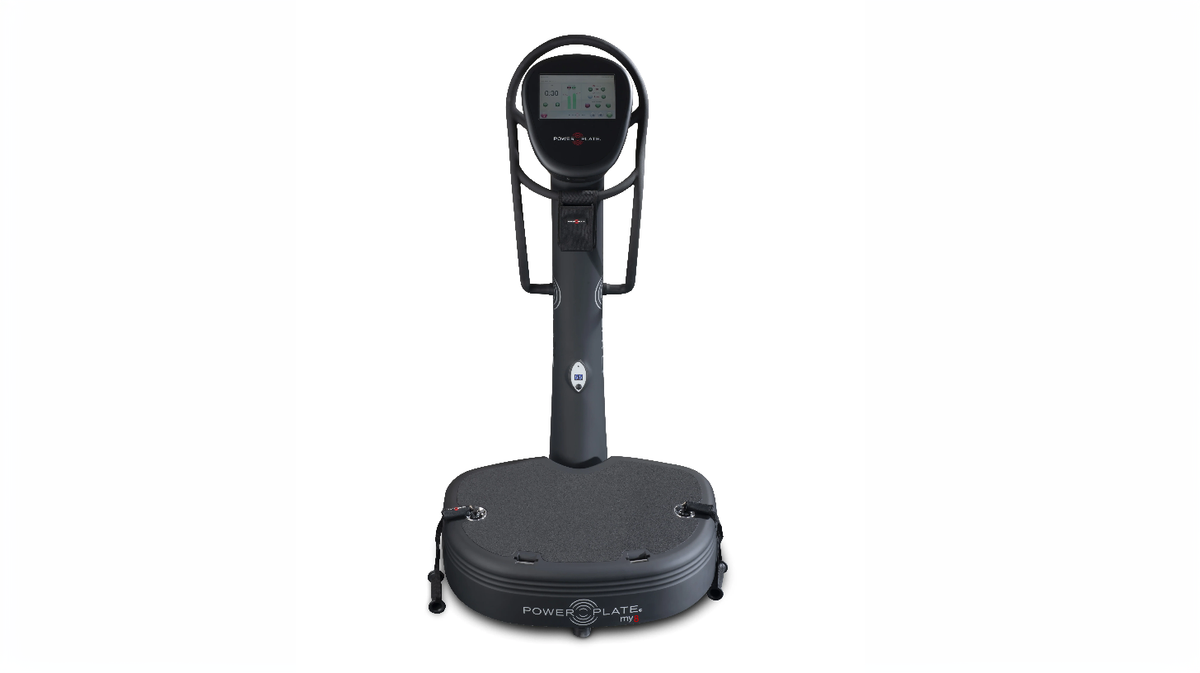 Power Plate my8 whole body vibration platform front view showing PrecisionWave vibration plate, integrated touchscreen training console, and retractable proMOTION resistance cable system