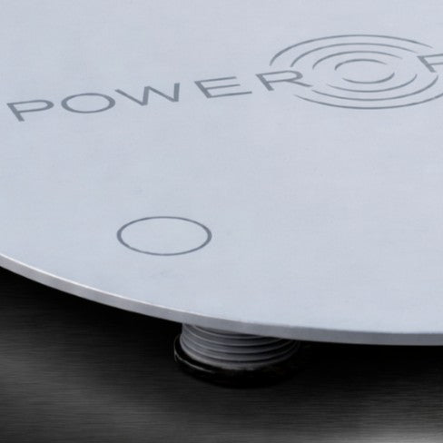 Power Plate Power Shield vibration isolation platform close-up showing vibration dampening support feet designed to reduce vibration transfer to flooring