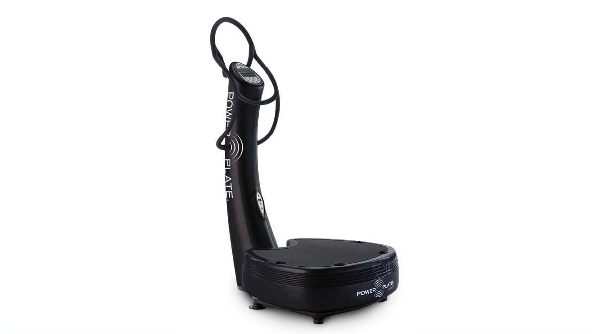 Power Plate pro5 whole body vibration platform with integrated column and handrails shown on white background