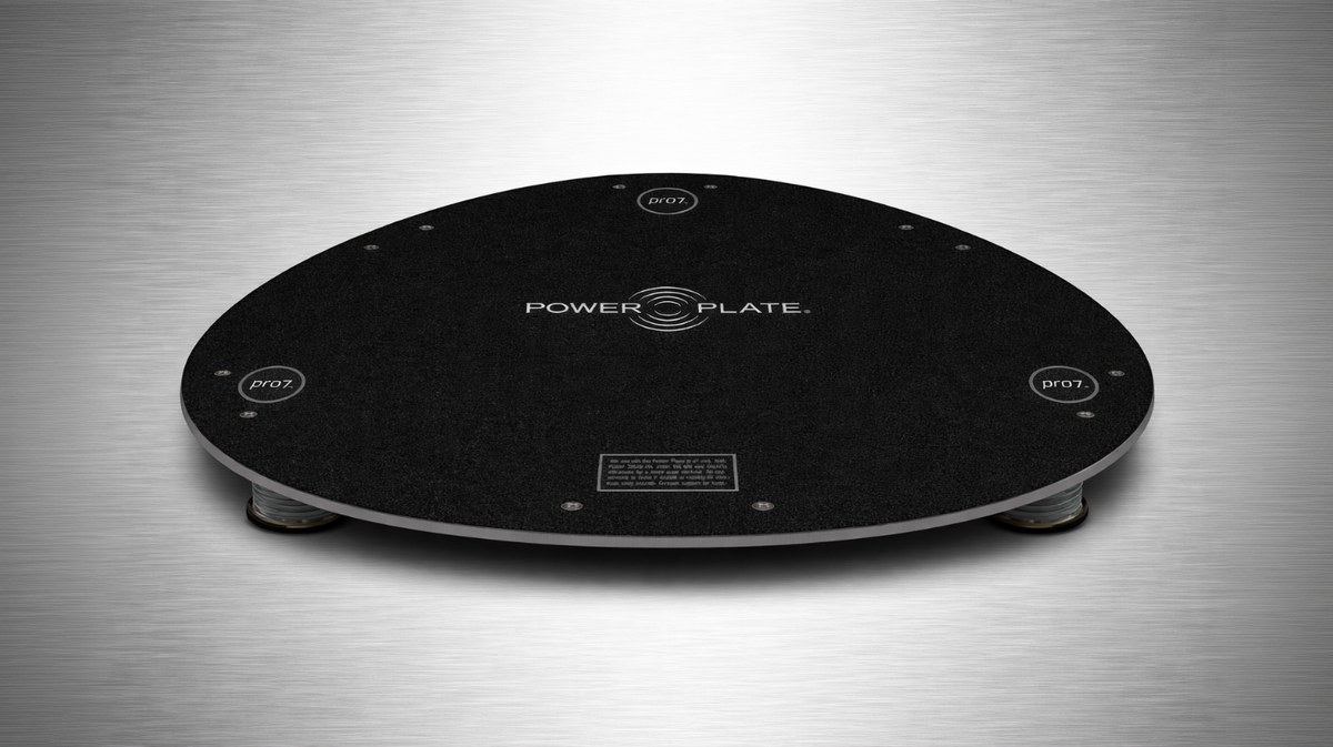 Front view of Power Plate pro7 pro8 Power Shield vibration reduction platform showing full base width and low profile construction for stable floor placement