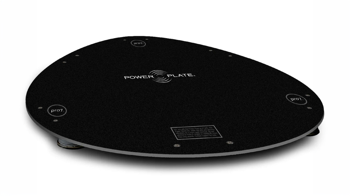 Power Plate pro7 pro8 Power Shield vibration reduction platform shown at angle highlighting low profile base design and vibration isolation structure
