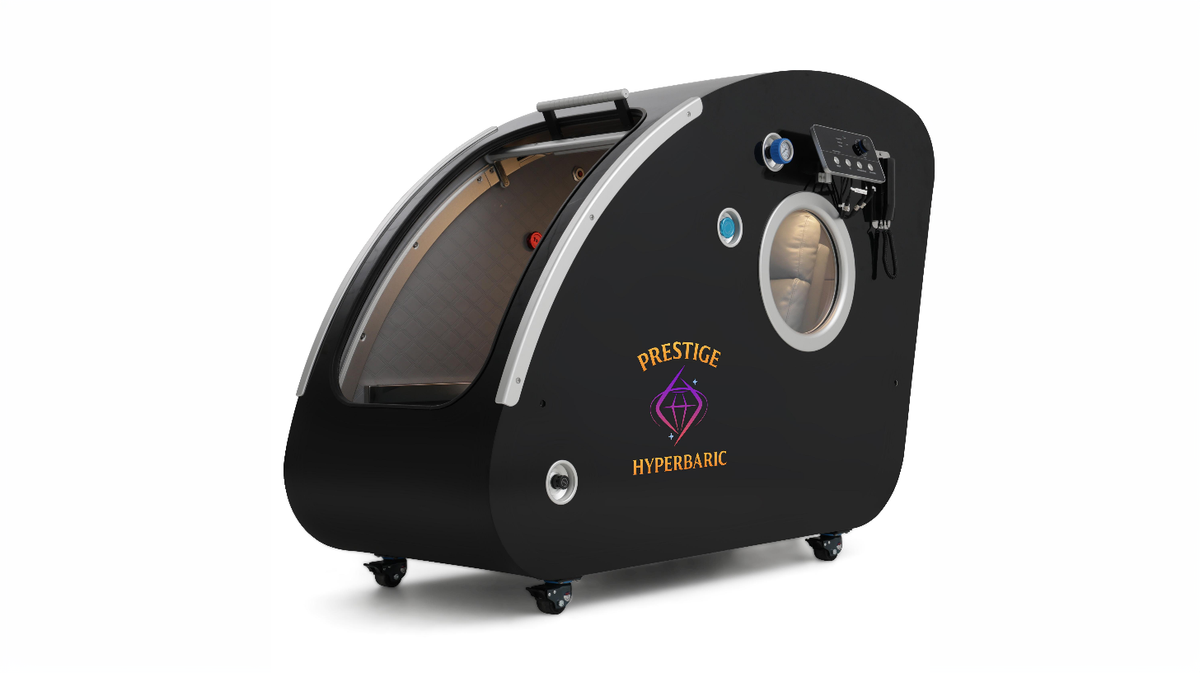 Prestige Hyperbaric Grand Sphere of Power hard shell HBOT chamber angled view showing door and control interface