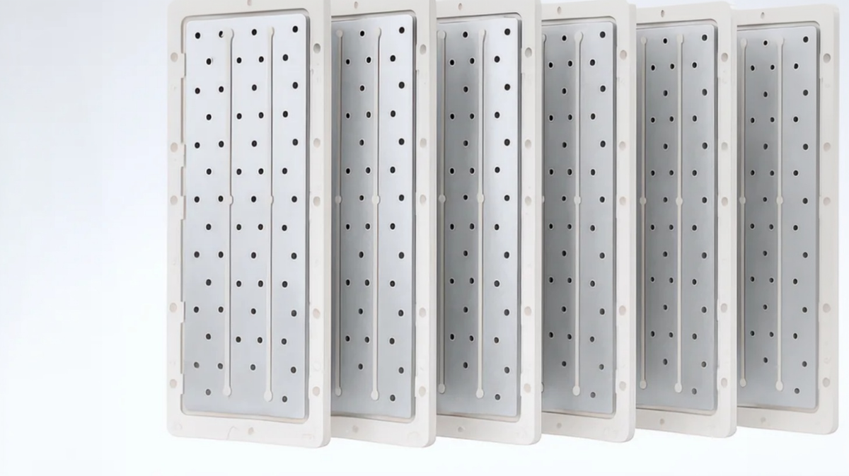 Tyent ACE-13 Turbo water ionizer internal electrolysis plates showing platinum coated titanium plate system