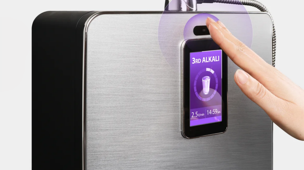 Tyent ACE-13 Turbo water ionizer countertop system motion sensor activation with user interaction in kitchen setting